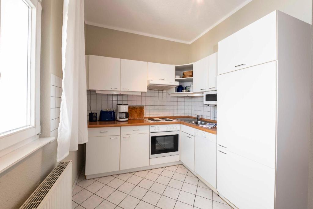 Ferienwohnung mit Seeblick und Schwimmbad room 5